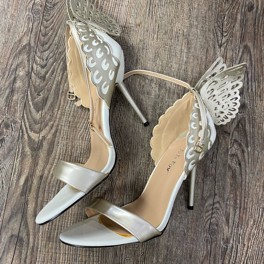 Excessive glue never worn butterflies heels